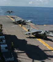 AV-8B Harrier II attack jets from Marine Medium Helicopter Squadron-264 (Reinforced), 26th Marine Expeditionary Unit, practice take-offs from the flight deck of the USS Bataan (LHD 5) August 19, 2006.  (Official USMC photo by Lance Cpl. Jeremy T. Ross) (Released)