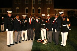 The Marines of Marine Barracks Washington,  honored Gunnery Sgt. Henry L. Baul and the Montford Point Marines at an Evening Parade, May 16. Fitting that the "Oldest Post of the Corps," founded in 1801, would pay tribute to the first Black American Marines, who attended segregated boot camp at Montford Point Camp in Camp Lejeune, N.C., from 1942 to 1949.