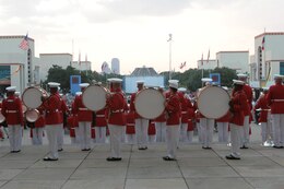 The U.S. Marine Drum and Bugle Corps from Marine Barracks Washington, D.C., performs at the opening ceremony of the State Fair of Texas in Dallas, Sept. 25.  The Drum and Bugle Corps or "The Commandant's Own" has performed at the state fair for more than 40 consecutive years.