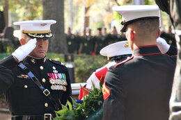 (JACKSONVILLE, N.C.) Col. John K. Love, commanding officer of the 8th Marine Regiment, 2nd Marine Division, salutes alongside SgtMaj. Rudy Resto, sergeant major of the 8th Marine Regiment, after laying a ceremonious wreath during the 23rd annual Commemoration of the Beirut Memorial Observance Ceremony at the Camp Lejeune Memorial Gardens, Oct. 23. (Marine Corps photo by Lance Cpl. Jonathan G. Wright)