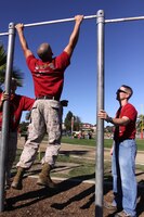 Sgt. Roberlan Padilla, financial clerk, Disbursing Company, Combat Logistics Regiment 17, 1st Marine Logistics Group, gets as many pull-ups as he can during Camp Pendleton’s 2010 Leatherneck Field Meet at the 11 Area field, Oct. 27. The Leatherneck Field Meet is a competition for Marines to compete against other units to build camaraderie and esprit de corps.
