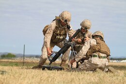 U.S. Marine Corps Cpl. Caleb D. Benson (left), Lance Cpl. Stephan A. Fournier (center), and Lance Cpl. Craig J. Reyes (right), mortarmen with Golf Company, Battalion Landing Team 2nd Battalion 7th Marines, 31st Marine Expeditionary Unit, conduct a weapons drill with a mortar on Camp Rocky during Talisman Saber 2011. TS11 is a biennial combined training activity, designed to train Australian and U.S. forces in planning and conducting Combined Task Force operations to improve Australian Defense Force/U.S. combat readiness and interoperability. It reflects the closeness of the alliance and the strength and flexibility of the ongoing military-military relationship.