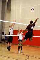 Samuel Lauesi, 34, 1st Medical Battalion 'Balls Out,' prepares to spike the ball during the 2011 USAA Pendleton Cup Intramural Volleyball League at Camp Pendleton’s 33-Area gym, Sept. 21. Each team played between two and three games for opening night, and throughout the series they will each play a total of eight games.