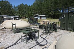 A lightweight water purification system is set up at Fort Pickett, Va., Sept. 10, 2012. The system is Combat Logistics Battalion's (CLB) 26, 26th Marine Expeditionary Unit (MEU), new water filtration system capable of cleaning 450 gallons of water per hour producing enough drinking water for an entire company. This training is part of the 26th MEU's pre-deployment training program. CLB-26 is one of the three reinforcements of 26th MEU, which is slated to deploy in 2013.
