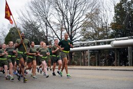 Gunnery Sgt. Weinburg Allen, staff non-commissioned officer in charge, Sergeants Course, Staff Non-Commissioned Officer Academy, leads his platoon of sergeants during physical training at Sergeants Course on Monday. Allen led the Marines on a 3.5-mile running tour of the base. 