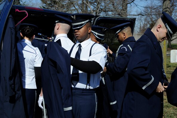 U.S. Air Force Honor Guard Body Bearers prepare for a funeral March 4, 2013, at Arlington National Cemetery. The eight-person team is responsible for carrying the remains of deceased service members, their dependents, senior and national leaders to their final resting place at Arlington National Cemetery. (U.S Air Force photo/Staff Sgt. Christopher Ruano)