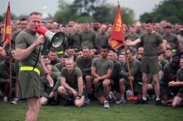 Brig. Gen. Edward D. Banta, the commanding general of 2nd Marine Logistics Group, speaks to Marines and sailors with the unit before the 2nd MLG field meet aboard Camp Lejeune, N.C., May 1, 2013. Banta fired up the servicemembers, as he spoke about the opportunities they will have to battle each other through sports. 