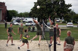 Marines with 2nd Marine Logistics Group play volleyball during a volleyball game at a unit’s field meet aboard Camp Lejeune, N.C., May 1, 2013. The winning teams moved on to compete in the championships to claim their unit as the best in the chosen sport. 