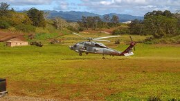 MARINE CORPS BASE HAWAII -  An SH-60B helicopter belonging to Helicopter Anti-Submarine Squadron Light 37 performs a landing. The unit recently celebrated a milestone of surpassing 100,000 flight hours. (Photo courtesy of HSL-37)

