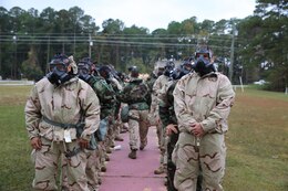 Marines and sailors with 2nd Supply Battalion, Combat Logistics Regiment, 2nd Marine Logistics Group prepare to enter a gas chamber during a mask confidence exercise aboard Camp Lejeune, N.C., Oct. 31, 2013. The exercise allowed the service members to build confidence that their protective equipment works and that they know how to use it properly. 
