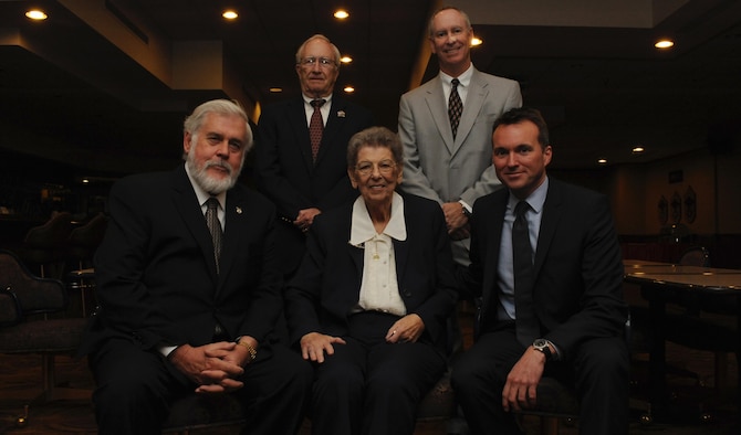 From left, Glendale Mayor Jerry Weiers; retired Brig. Gen. Tom Browning, former 58th Fighter Wing commander from the early ‘90s; David Scholl, Fighter Country Partnership chairman of the board; and Acting Secretary of the Air Force Eric Fanning pose with Dorothy Rowe, the former 56th Comptroller Squadron financial analysis chief, middle, after Rowe’s retirement ceremony Nov. 5 at Luke Air Force Base, Ariz. Rowe retired after a 70-year career, making her the longest-serving civil servant in the Air Force.