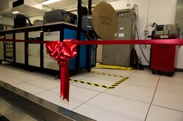 A ribbon cordons off an F/A-18 APG-73 Radar System Integrated Test Bench in preparation for an inauguration ceremony for the new equipment aboard Marine Corps Air Station Miramar, Calif., March 28. Marine Aviation Logistics Squadron 11 celebrated opening the bench for use by giving a tour and explanation of its uses and other statistics to squadron commanding officers and other distinguished guests.

