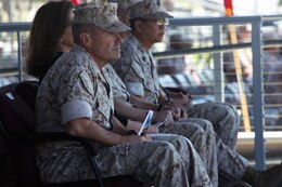 Brigadier Gen. Vincent Coglianese, commanding general, 1st Marine Logistics Group, observes the ceremony re-designating Combat Logistics Regiment 17, 1st MLG as Headquarters Regiment aboard Camp Pendleton, Calif., March 31, 2014. The re-designation took place on the eighth anniversary of CLR-17’s beginning in 2006.