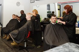 American Clipper barbers provide haircuts to customers aboard Marine Corps Logistics Base Albany, recently. American Clipper is located in the Marine Corps Exchange.