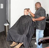American Clipper barbers provide haircuts to customers aboard Marine Corps Logistics Base Albany, recently. American Clipper is located in the Marine Corps Exchange.