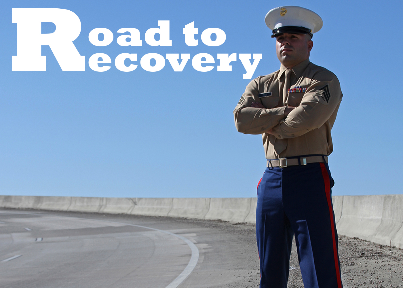 Sgt. Landon Rios, a canvassing recruiter with Recruiting Substation Augusta, Recruiting Station Columbia, stands on a bypass in the city of Augusta, Ga., on Dec. 17. Rios suffered severe injuries following a motorcycle accident at this location on June 20. (Marine Corps Photo by Sgt. Aaron Rooks)