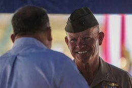 Major Gen. Lawrence Nicholson, the commanding general of 1st Marine Division, greets guests at the 1st Combat Engineer Battalion change of command ceremony aboard Camp Pendleton, Calif., June 18, 2014. During the ceremony Lt. Col. Andrew Winthrop, the former commanding officer of 1st CEB, 1st Marine Division relinquished command of the battalion to Lt. Col. Colin Smith.