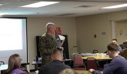 Cmdr. Ken Counts, the chaplain for Combat Logistics Regiment 27, 2nd Marine Logistics Group discusses the importance of communication to service members and their spouses during a marriage Prevention and Relationship Enhancement Program [PREP] workshop aboard Camp Lejeune, N.C., Feb. 26, 2014. Counts went over multiple statistics on the benefits of maintaining a healthy marriage, one of which is that married couples live longer, more successful lives.  (U.S. Marine Corps photo by Lance Cpl. Shawn Valosin)