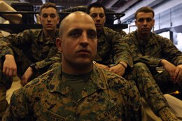 USS DENVER, At Sea – Sergeant Walter J. Krueger, a squad leader for Company F., Battalion Landing Team 2nd Battalion, 5th Marine Regiment, 31st Marine Expeditionary Unit and a native of Memphis, Tenn., stands in front of the three team leaders in his squad inside the well deck here, March 1. He is recognized as one of the best leaders in his unit, highlighted by his ability to mentor and develop young Marines. Krueger and the Marines of BLT 2/5 are currently deployed with the 31st MEU aboard the ships of the Bonhomme Richard Amphibious Ready Group as part of a regularly scheduled Spring Patrol of the Asia-Pacific region. (Marine Corps photo by Sgt. Paul Robbins Jr.)