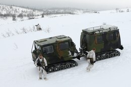 Giskaas, Norway – Marines with Golf Company, 2nd Battalion, 2nd Marine Regiment, 2nd Marine Division set up security around a Bandvagn 206 during a pre-environmental training field exercise to prepare them for exercise Cold Response 2014. Marines and Norwegian soldiers spent three days learning to work together and how to operate in the Norwegian winter environment to prepare the Marines and soldiers for Exercise Cold Response, which is a multinational and multilateral training exercise. The exercise will feature various types of military training including maritime, land and air operations. The location, above the Arctic Circle in northern Norway, provides a unique cold-weather environment for all forces involved to learn and develop procedures from one another.