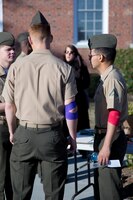 Marines with the 2nd Marine Logistics Group wait during a monitoring period after donating blood aboard Marine Corps Base Camp Lejeune, N.C., March 14, 2014. After donating a pint of blood, each Marine was able to pick the color of bandage that would be applied to their arm and enjoyed snacks and refreshments. 