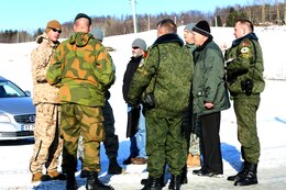 Representatives from U.S. Marine Corps Forces Europe and Africa and a liaison team from the Defense Threat Reduction Agency conduct an inspection of U.S. Marine components participating in Cold Response 14 with Belarus inspectors and Norwegian escorts on a dock in Soreisa, Norway, March 17. The inspection during Cold Response 14 is conducted under the auspices of the Vienna Document, which obligates signatories from more than 50 nation States to exchange information in regards to size, structure, training and equipment of its armed forces as well as related defense policy, doctrines to build multilateral transparency, trust, cooperation and confidence.

