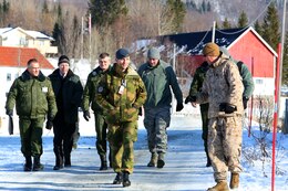 Representatives from U.S. Marine Corps Forces Europe and Africa and a liaison team from the Defense Threat Reduction Agency conduct an inspection of U.S. Marine components participating in Cold Response 14 with Belarus inspectors and Norwegian escorts on a dock in Soreisa, Norway, March 17. The inspection during Cold Response 14 is conducted under the auspices of the Vienna Document, which obligates signatories from more than 50 nation States to exchange information in regards to size, structure, training and equipment of its armed forces as well as related defense policy, doctrines to build multilateral transparency, trust, cooperation and confidence.

