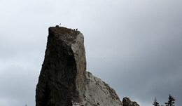 Corporal Scott Bradley and Lance Cpl. Dakota Marshall, two Marines with Black Sea Rotational Force 14 from 3rd Battalion, 8th Marine Regiment, reach the peak of a cliff with two Romanian soldiers of the 17th Mountain Troop Bn. during Exercise Platinum Lynx in the Carpathian Mountains, May 8, 2014. Exercise Platinum Lynx 14-5 is a bilateral exercise between the United States Marines and sailors, and Romanian Land Forces, designed to build familiarity and interoperability between the United States and their Romanian allies through squad and platoon level infantry training. (Official Marine Corps photo by Lance Cpl. Scott W. Whiting, BSRF PAO/ Released)