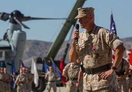 Lt. Col. John Field, outgoing commanding officer of Marine Medium Helicopter Squadron (HMM) 364, gives a speech during a change of command and redesignation ceremony aboard Marine Corps Air Station Camp Pendleton, Calif., Oct. 9. Field relinquished command to Lt. Col. Paul B. Kopacz.