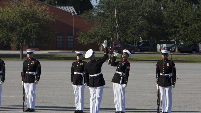Marines from the Marine Corps Silent Drill Platoon perform at Marine Corps Recruit Depot Parris Island Parris Island, S.C. for the centenial celebration of the depot, Oct. 16, 2015. The battle colors ceremony was performed for Marines, veterans and guests at the depot. 