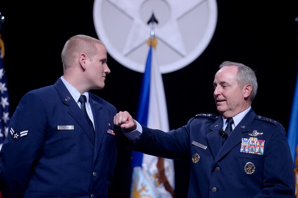 Air Force Chief of Staff Gen. Mark A. Welsh III speaks with Airman 1st Class Spencer Stone during Welsh's Air Force Update address at the Air Force Association's Air and Space Conference and Technology Exposition Sept. 15, 2015, in Washington, D.C. (U.S. Air Force photo/Scott M. Ash)  